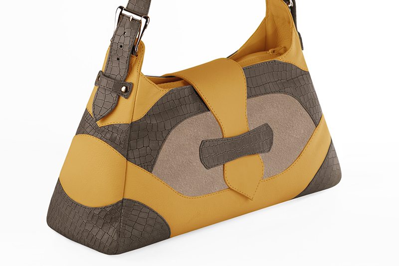 Handcrafted women's luxurious elegant handbag in premium taupe brown, tan beige and mustard yellow leather. Perfect for elevated everyday style.   
                Choose from our luxurious collections of leather and fabric to perfectly match your handbags to your outfits.